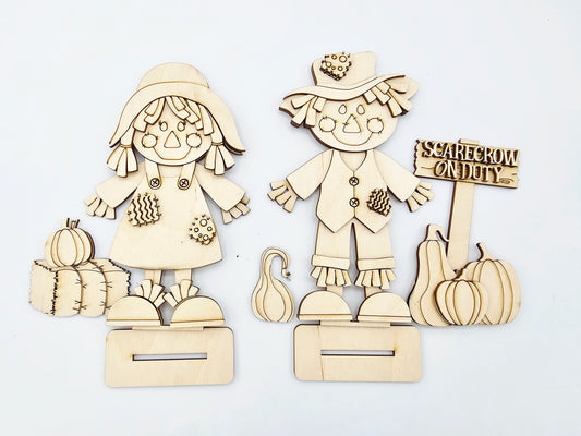 Scarecrow Couple Sitters